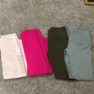 Set of Four Women's Leggings in Pink, Green, Blue, and Cream